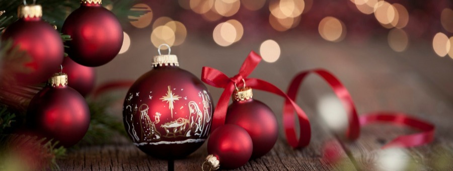 christmas-tree-and-nativity-ornaments-on-an-old-wood-background-picture-id1182177628-1